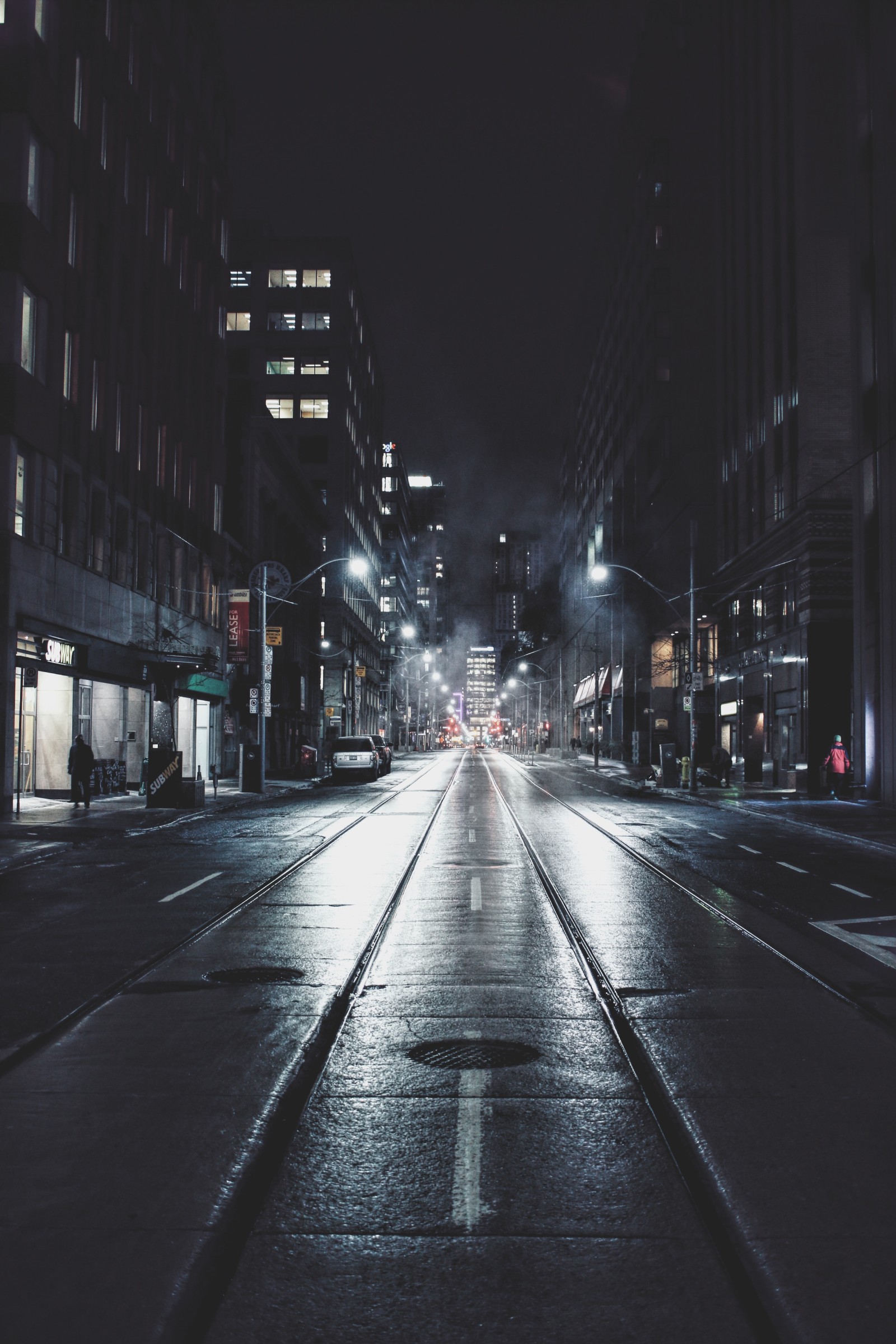 Nightscape of a brightly lit city street