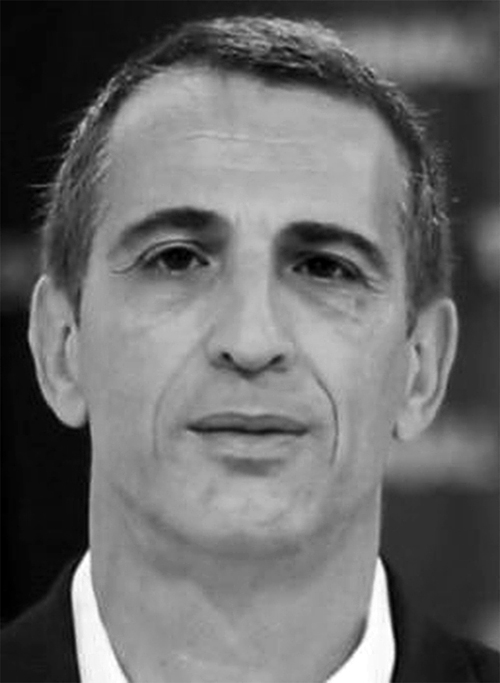 a man with a serious expression